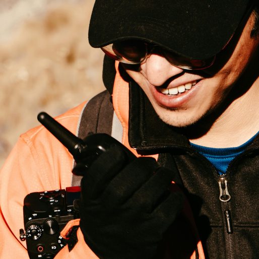 Man holding a PTX transceiver
